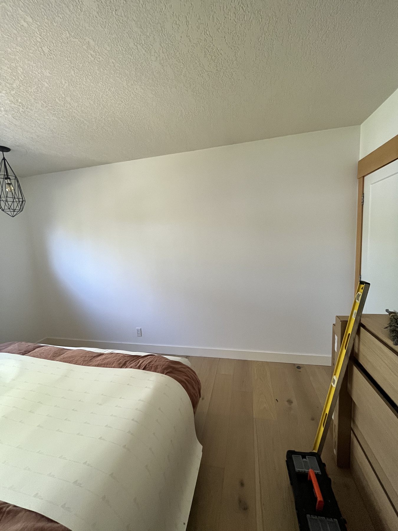 Bedroom wall before a mural was installed