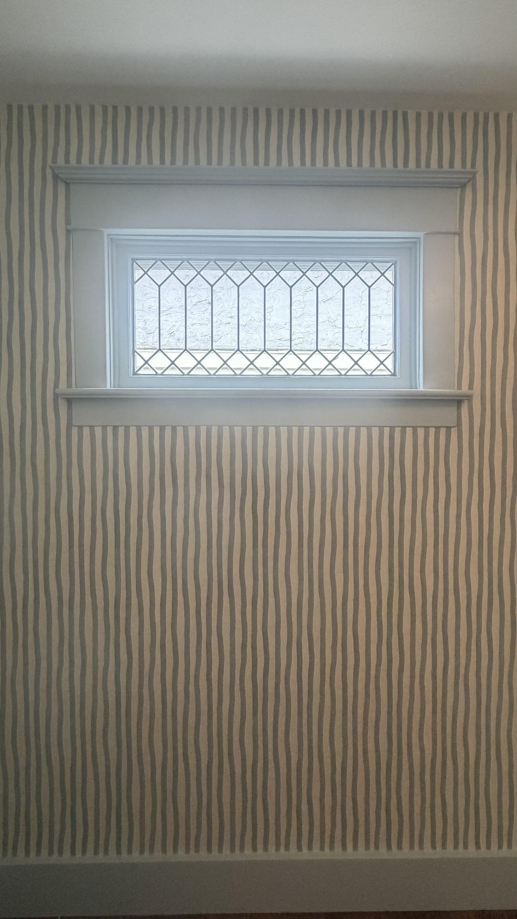 Textured stripe wallpaper accent wall
